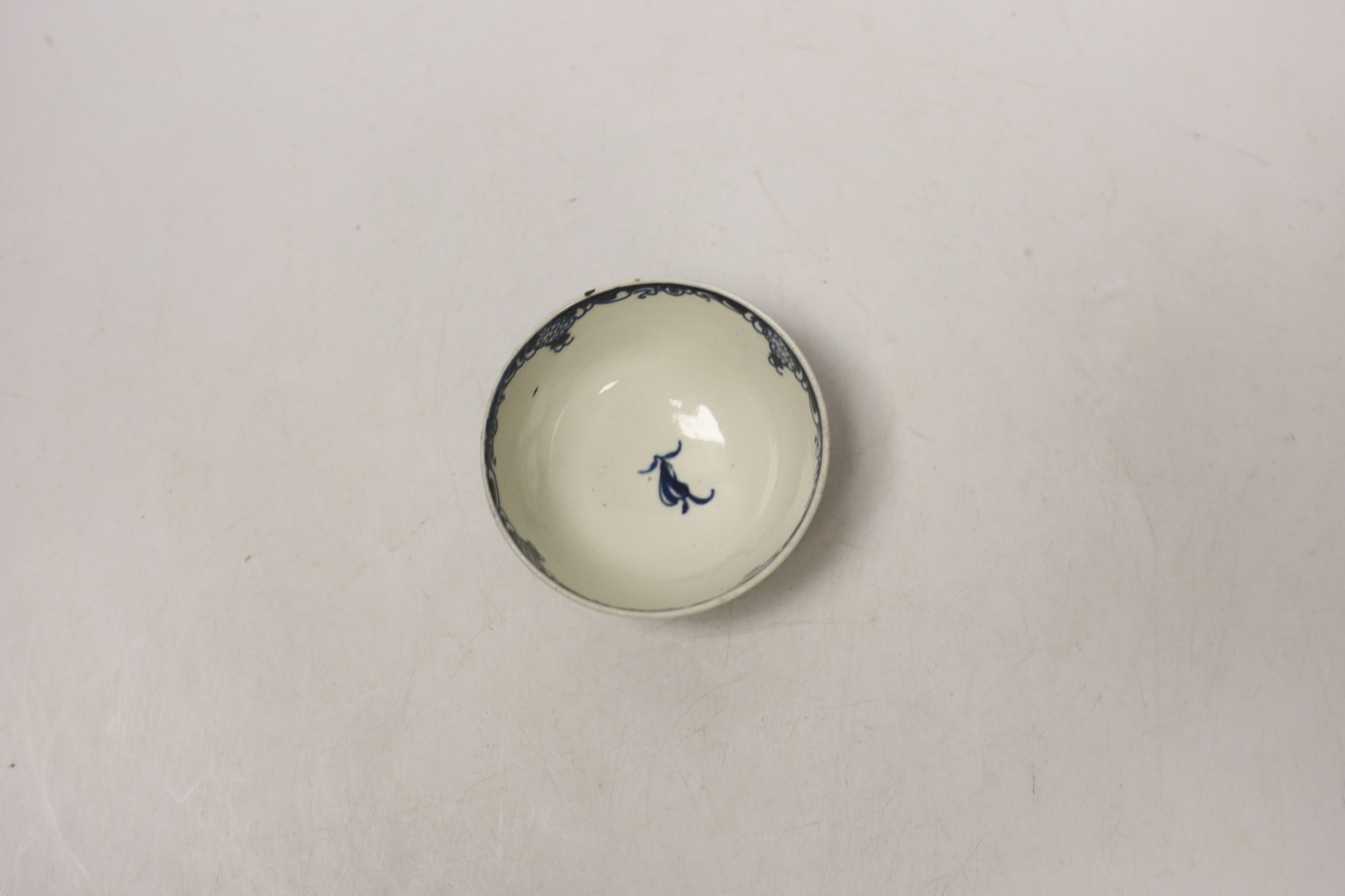 A Worcester tea bowl, Mansfield pattern and a saucer, Fruit and Flower pattern